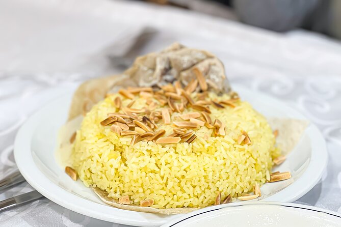 Amman Food Tours: 3-Hours Guided Walking Food Tour in Amman - Walking downhill toward old downtown Amman