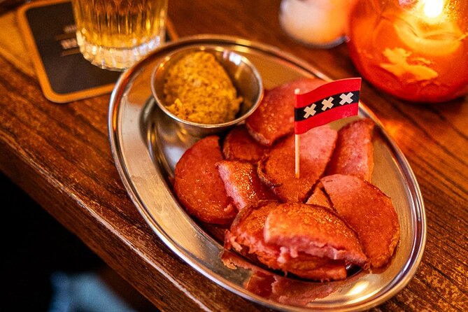 Amsterdam Food Tour: +10 Tastes, Culture and Canals with Sherpa - Rokin: herring, sausage, and a local beer