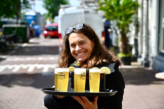 Amsterdam Food Tour of 10+ Local Classic Tastings in Jordaan Area - At the fishmonger: herring and kibbeling