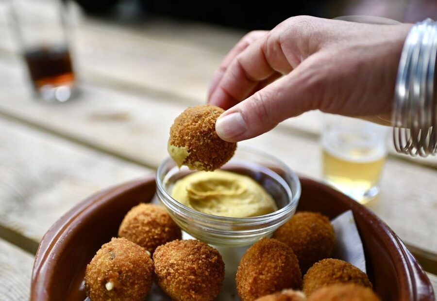 Amsterdam: Jordaan Food Tour of 10+ Local Classic Tastings - Savory Dutch snacks: ham, sausage, and bitterballen