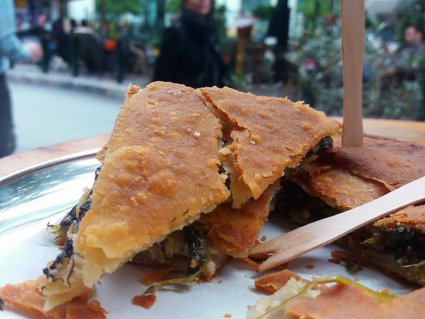 Athens: Traditional Greek food tour in hidden spots - Starting beside En Athinas in central Athens