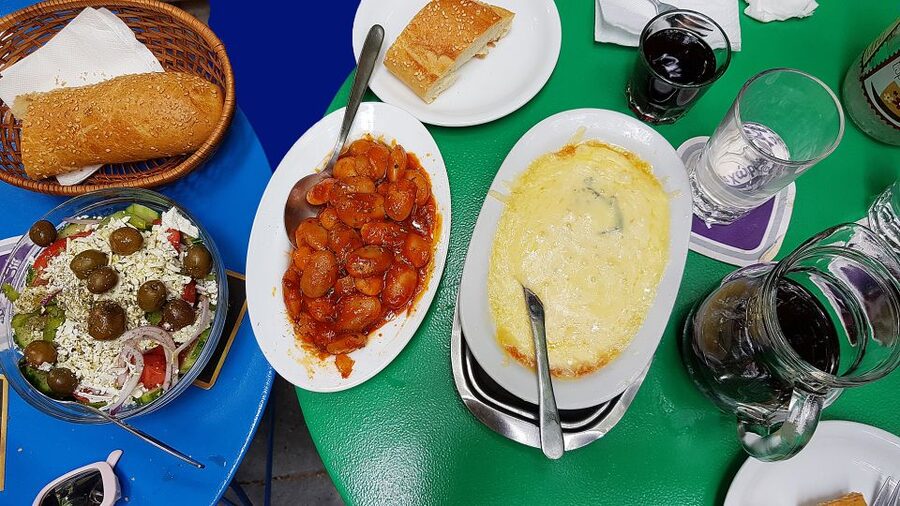 Athens: Traditional Greek food tour in hidden spots - Reading Athens through its working markets