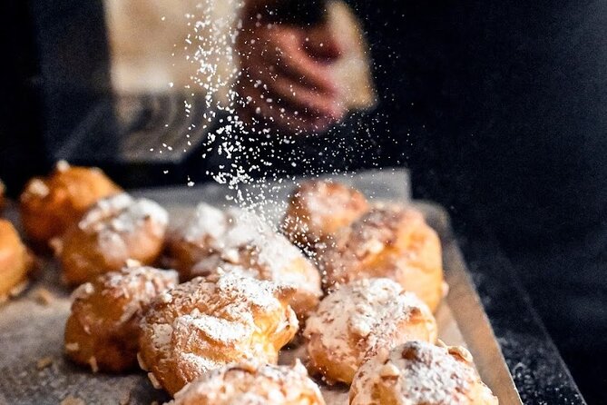 Authentic Parisian Gourmet Food Tour with 10 Local Dishes & Wines - Notre Dame: pastries, oysters, galettes, and island streets