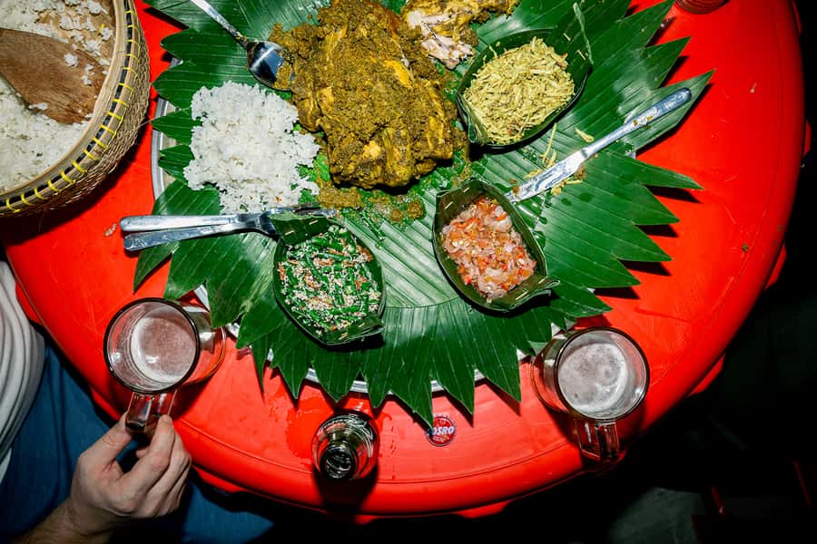 Bali: Bites Food Tour with over 15 Tastings - Ayam betutu and a family food business