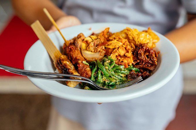 Bali Private Food Walking Tour With Locals: The 10 Tastings - Catur Muka Statue adds a useful city pause