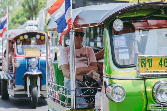 Bangkok Electric Tuk Tuk: Thonburi, Wang Lang & Food Tour - A riverside cafe and a short public-boat ride