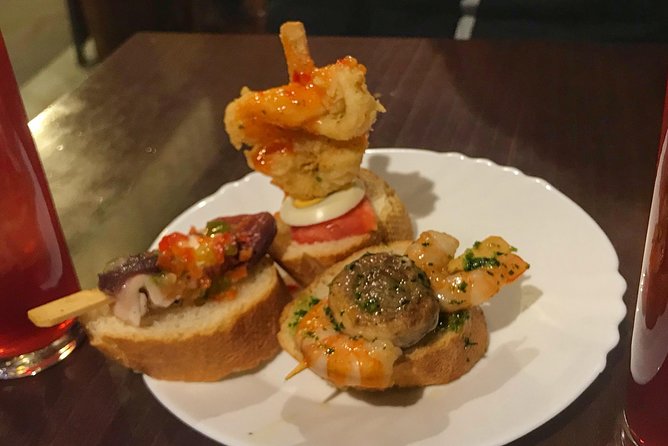 Barcelona Food Tour: Market & Gothic Quarter with Expert Guide - Pinchos and patatas bravas in the Gothic Quarter
