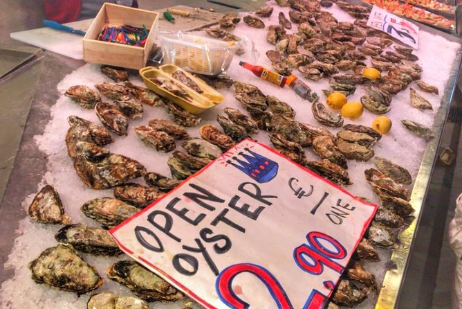 Barcelona Food Tour: Market & Gothic Quarter with Expert Guide - Plaça del Rei and Roman Barcelona