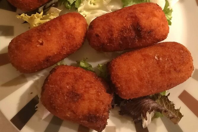 Barcelona Food Tour: Tapas, Drinks and Delights with a Local - Plaça de Sant Josep Oriol and pintxos