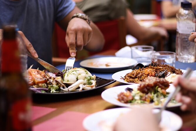 Barcelona Food Tour: Tapas, Paella, Sangria & 8+ Local Tastings - Tapas, paella, and the part where you should arrive hungry