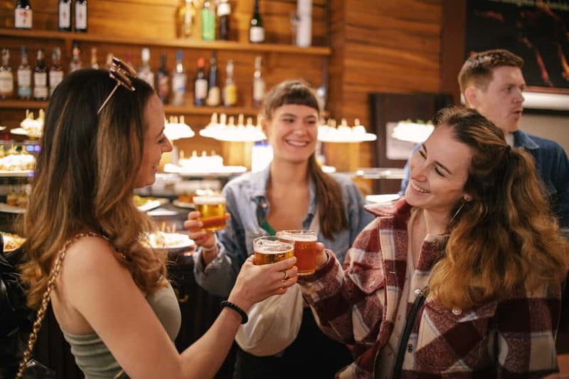 Barcelona: Food Walking Tour with Tapas and Wine - Nine tapas, from bravas to dessert