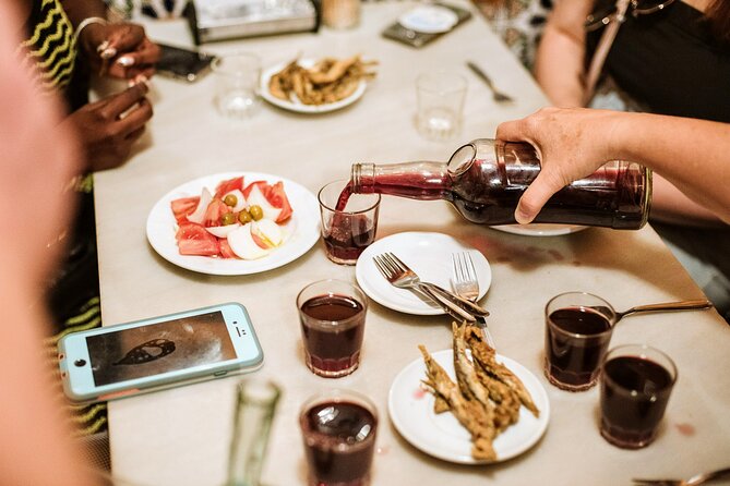Barcelona Gothic Quarter Tapas & Taverns Food & Wine Tour - The final meal in an early twentieth-century setting