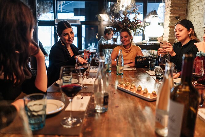 Barcelona: Guided Food Walking Tour with Tapas and Wine - Croquettes, bravas, and Padrón peppers on Carrer Ample