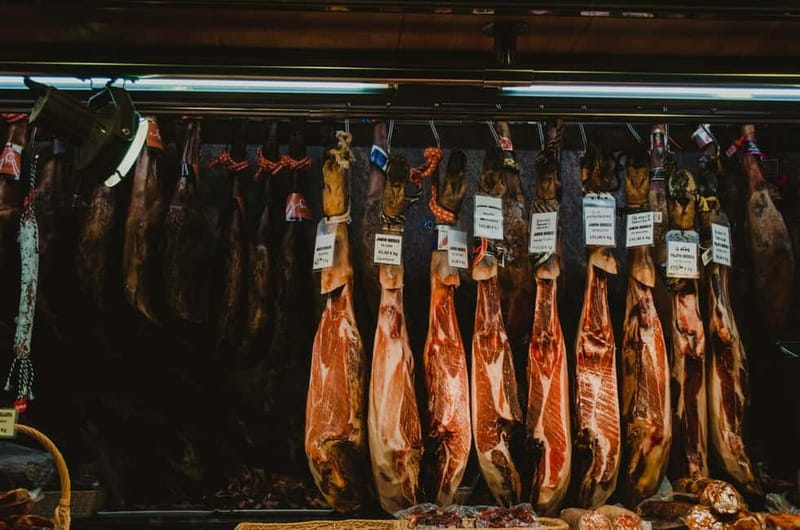 Barcelona: Markets Tour With Food and Wine Tasting Upgrade - What the premium cheese, meat, and wine upgrade adds