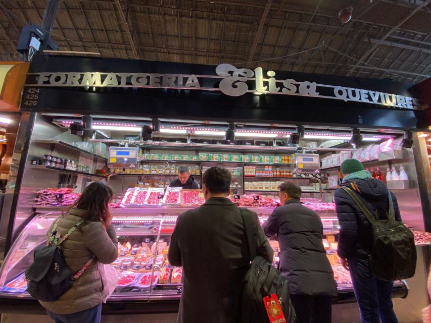 Barcelona: Street Food & Sightseeing Tour with Local Market - Family-run food stops and local advice