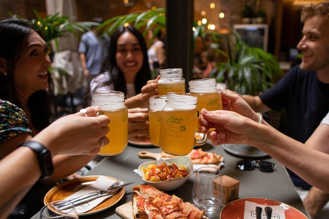 Barcelona Tapas Food Tour, Taverns, History & Local Culture - Rambla de Catalunya and the city’s public stage