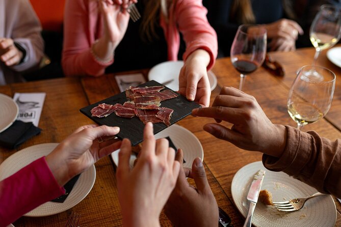 Barcelona Tapas Food Tour with Lunch or Dinner in El Born - Paella, cava, and a Spanish finish