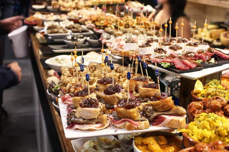 Barcelona: The Ultimate Local Tapas & Drinks Food Tour - Pimientos padron and pan con tomate