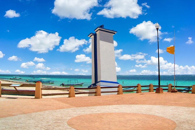 Beachside Tacos & Town Tour with Tequila Tasting From Cancun - Walking through the square and seaside streets