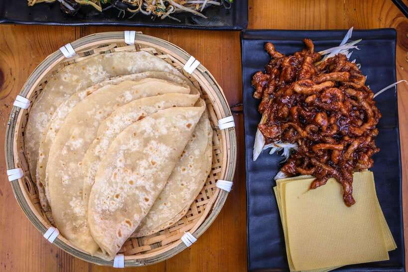 Beijing: Hidden Gems Guided Food Tour with Beer and Tastings - The hutongs are part of the meal