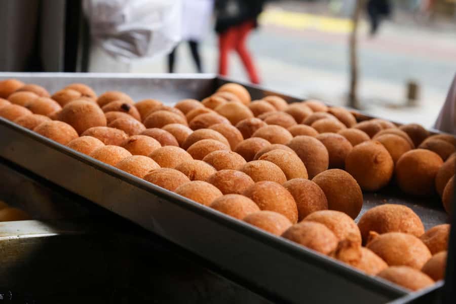 Bogota Food Tour with over 12 Tastings & Tejo - Chichería, buñuelos, and a glass of avena
