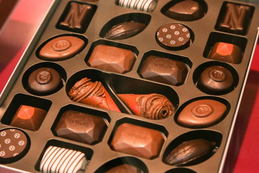 Brussels: Chocolate Appreciation and Tasting Walking Tour - Grand Place adds a Brussels history lesson