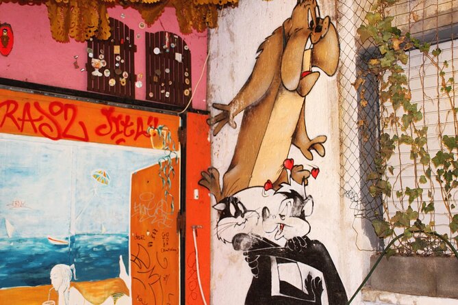 Budapest Ruin Bars Evening Walking Tour with Drinks & Snacks - District 7 street art between the bars