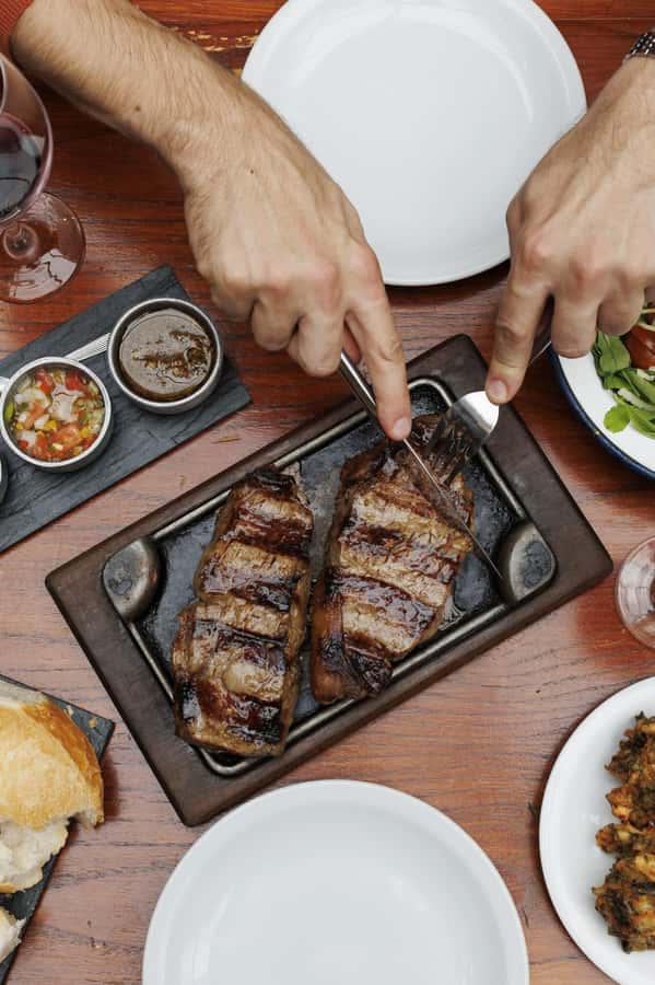 Buenos Aires: Local Foodie Adventure with Sherpa Food Tours - The bodegón brings the comfort food