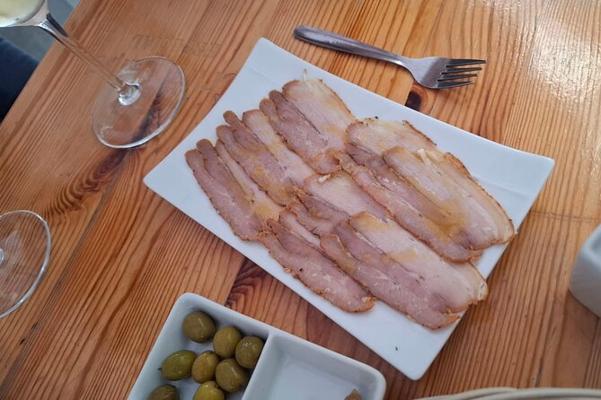 Cadiz Food Tour: Tapas, Drinks and Delights with a Local - Torre Tavira and a bakery founded in 1961