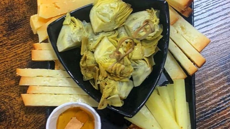Cagliari: Food and Wine Tasting Experience - What fills the tasting table