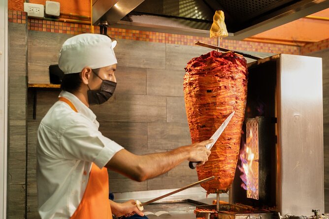 Cancun Taco & Mexican Food Tour with Tequila Tasting - Flame-grilled carne asada at Los de Asada