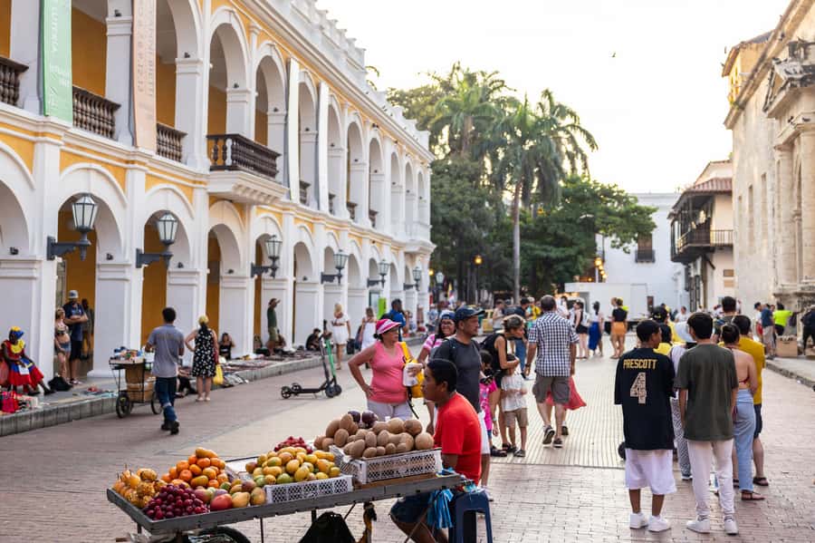 Cartagena: Guided Street Food Tour with Tastings - Start under the orange umbrellas at Plaza Cervantes