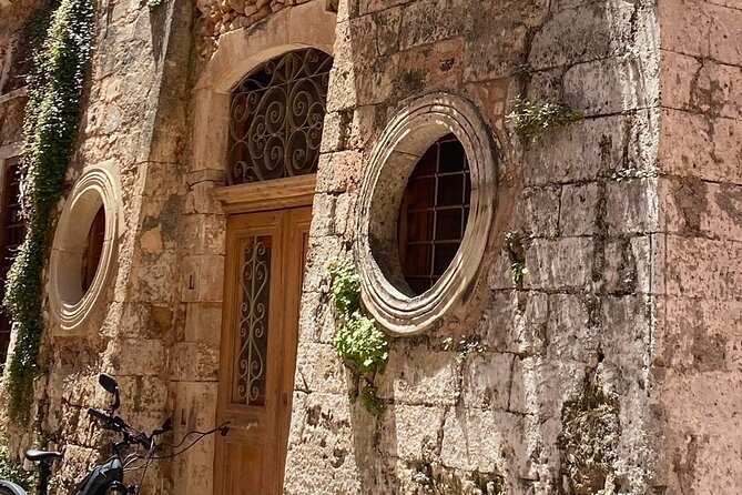 Chania Walking Food And Wine Night Tour - Venetian lanes and the old harbor at sunset