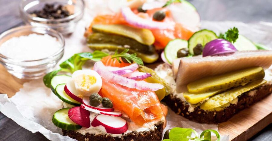 Copenhagen: Scandinavian Delights Food & Drink Private Tour - Torvehallerne: fish cakes in a market setting