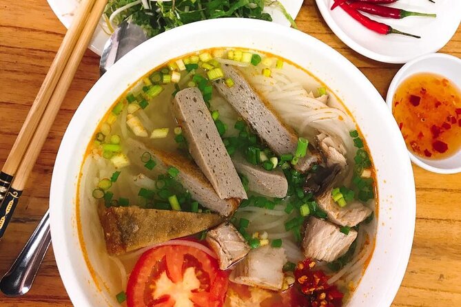 DaNang Night Foodie Tour-Sighseeing with Aodai Lady Rider Private - Five or seven dishes, with room for seafood