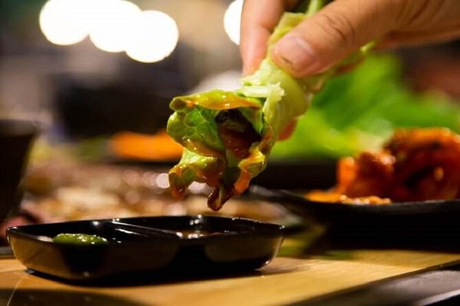 DaNang Night Foodie Tour-Sighseeing with Aodai Lady Rider Private - Dragon Bridge and the Han River at night