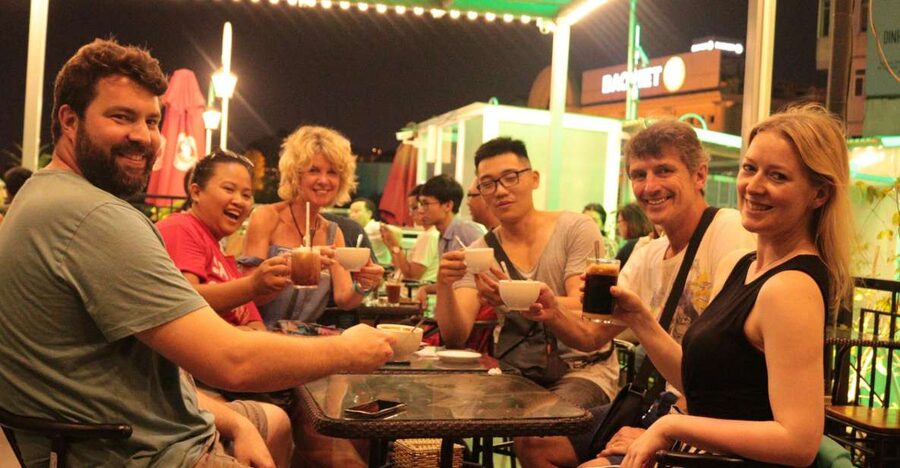 Discover Hanoi's Street Food by Night & Mini Class Coffee - Hanoi street food begins with a small chair