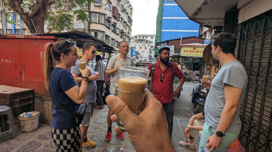 Discover Mumbai's street & beach with Vegetarian food tour - The train ride and moving through Mumbai