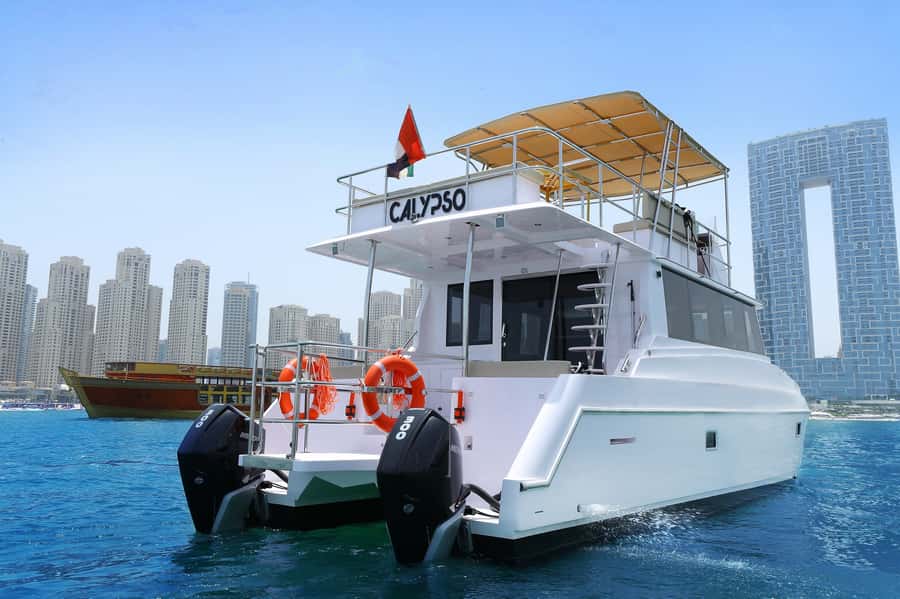 Dubai: Luxury Sightseeing Cruise with Food and Drinks - Marina Canal: towers, yachts, and the first photographs