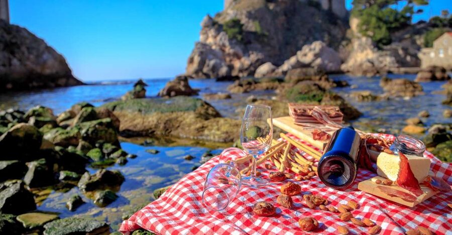 Dubrovnik Gastronomy: 3-Hour Food and Wine Tour - Walking through the Old Town between bites