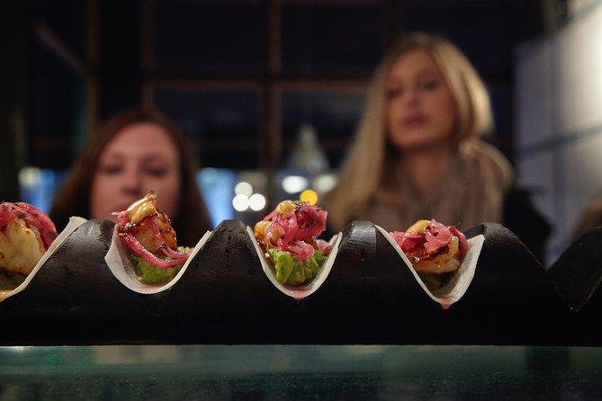 Eating London: Twilight Soho VIP Food & Drinks Tour - Chinatown and Bun House keep the walk lively