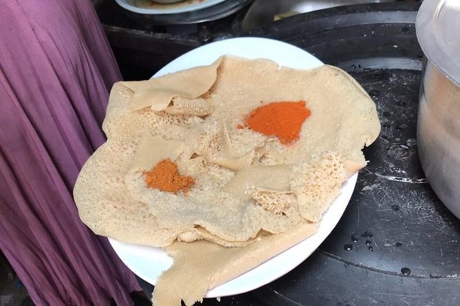 Ethiopian Culinary Tour - Market, Food, Coffee Ceremony & more - Piassa and the city between meals