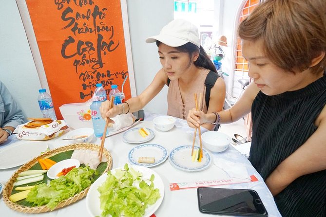 Evening Walking Food Tour, folk game and lantern boat - Meeting at White Rose Restaurant at 4:30 pm