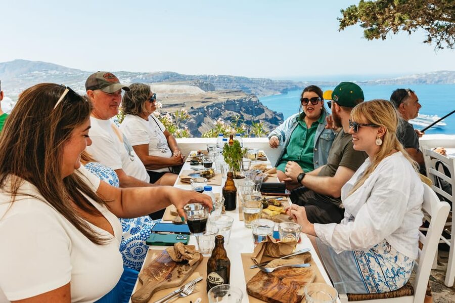 Fira: Guided Foodie Walking Tour with Tastings - Walking the caldera edge toward Fira