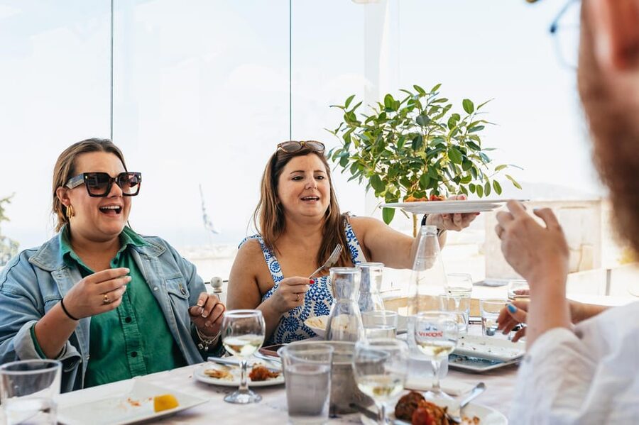 Fira: Guided Foodie Walking Tour with Tastings - The daily market and the tavern meal