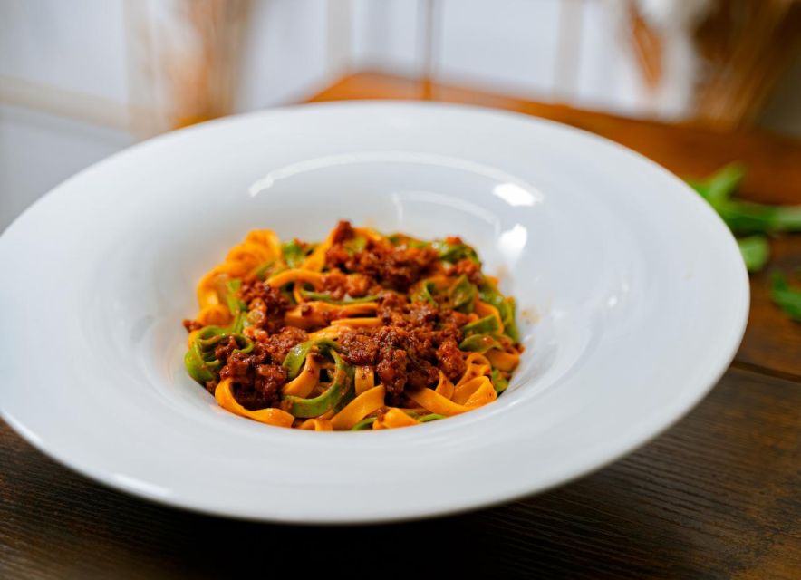 Florence: Art of Pasta Cooking Workshop with Food and Wine - Tuscan wine keeps the class social