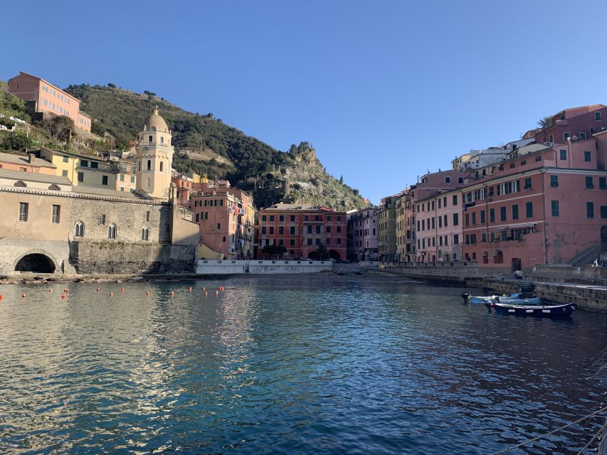 Florence: Cinque Terre Day Trip with Optional Street Food - Riomaggiore, colorful houses and the first sea crossing
