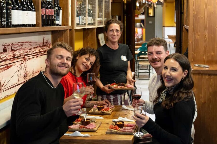 Florence: Food Walking Tour with Local Steak and Tuscan Wine - A wine window and Florence’s aperitivo tradition