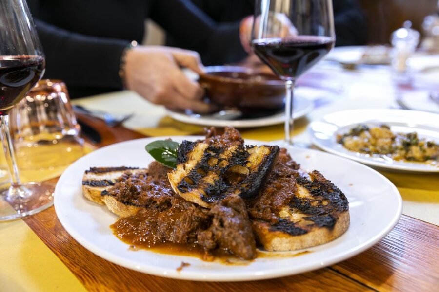 Florence: Sant’Ambrogio Market Food Tour of 10+ Local Dishes - Sitting down for Tuscan pasta and family cooking