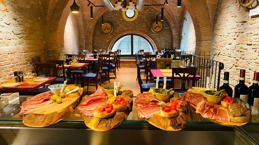 Florence: Taste of Tuscany Wine and Local Food Tour - Inside the traditional cellar near Central Market